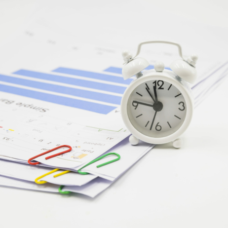 alarm-clock-papers-with-clips